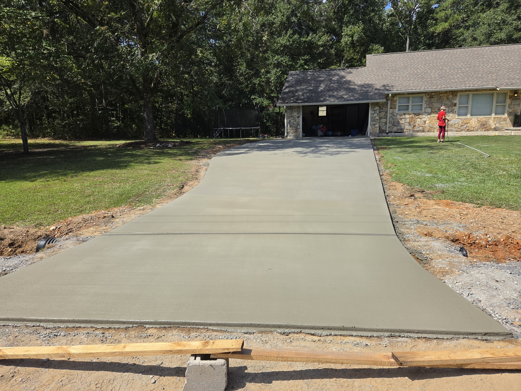 Concrete Solutions driveway project in front of a home