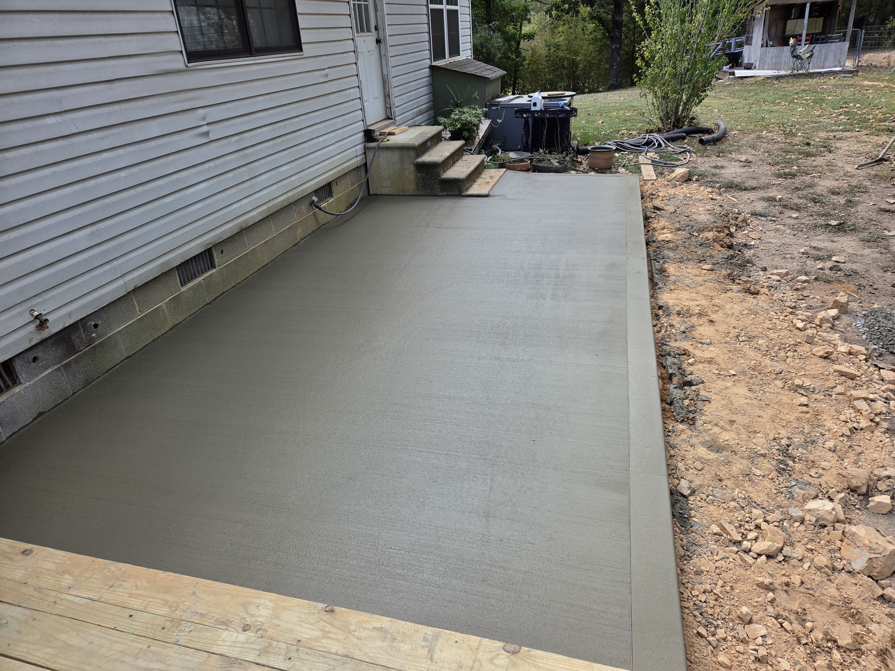 Concrete patio beside a client's home